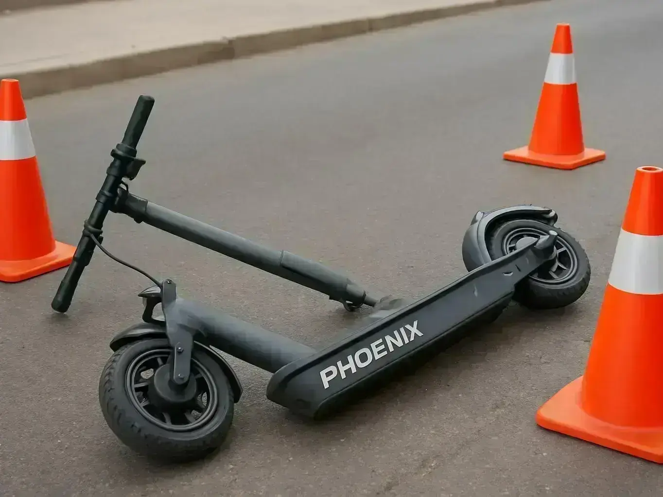 Phoenix accident attorney investigating hit and run scooter crash near Central Avenue and Indian School Road